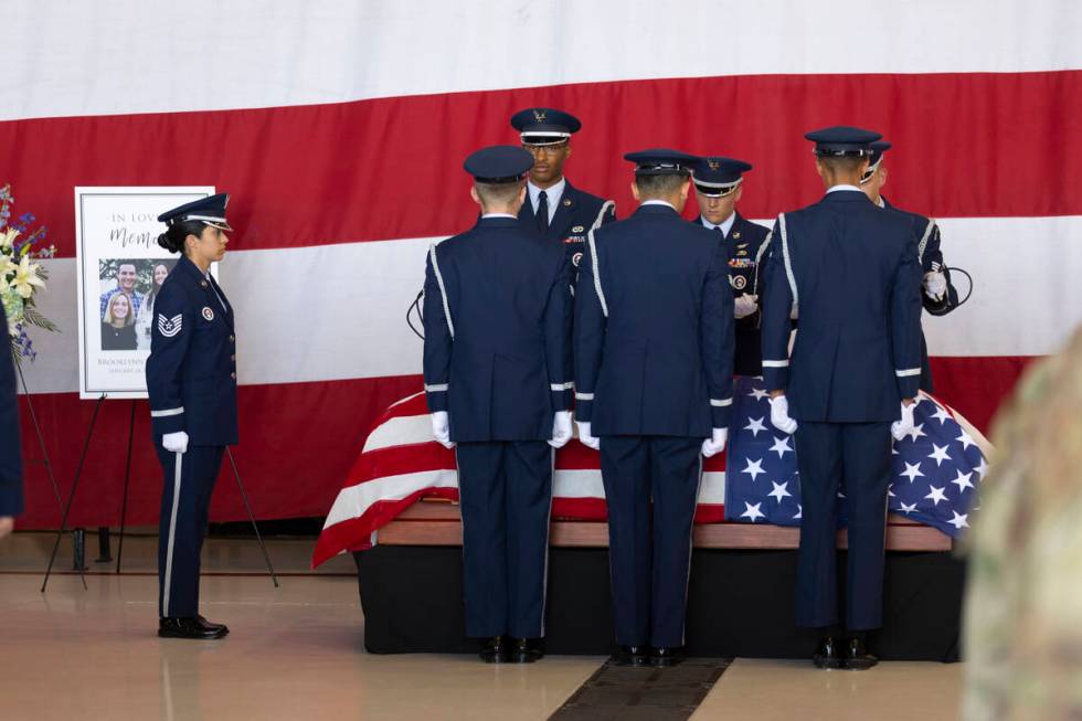 Members of the Nellis Air Force Base honor guard lay down the casket of Brooklynn Fellure, a ve ...