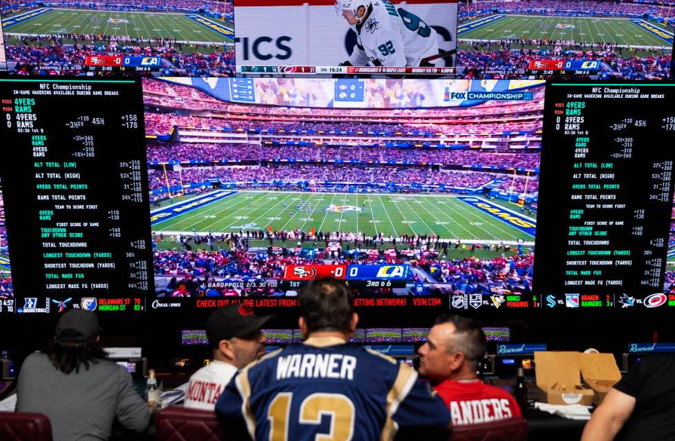 Los Angeles Rams and San Francisco 49ers fans watch the NFC Championship at Circa Sportsbook on ...
