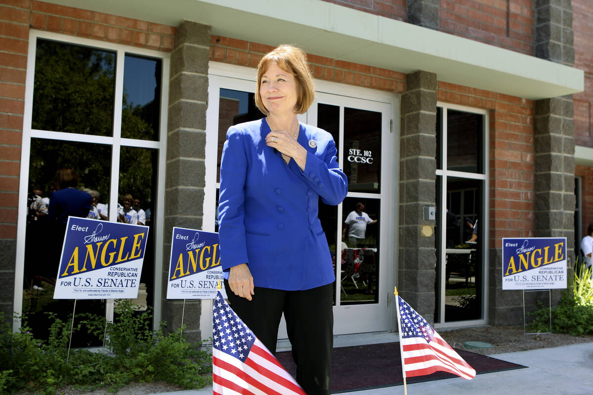 Republican candidate for U.S. Senate Sharron Angle stands outside her campaign headquarters on ...