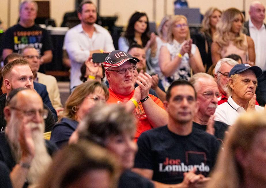 People attend the Republican Party campaign event at Treasure Island hotel-casino on Friday, Ju ...