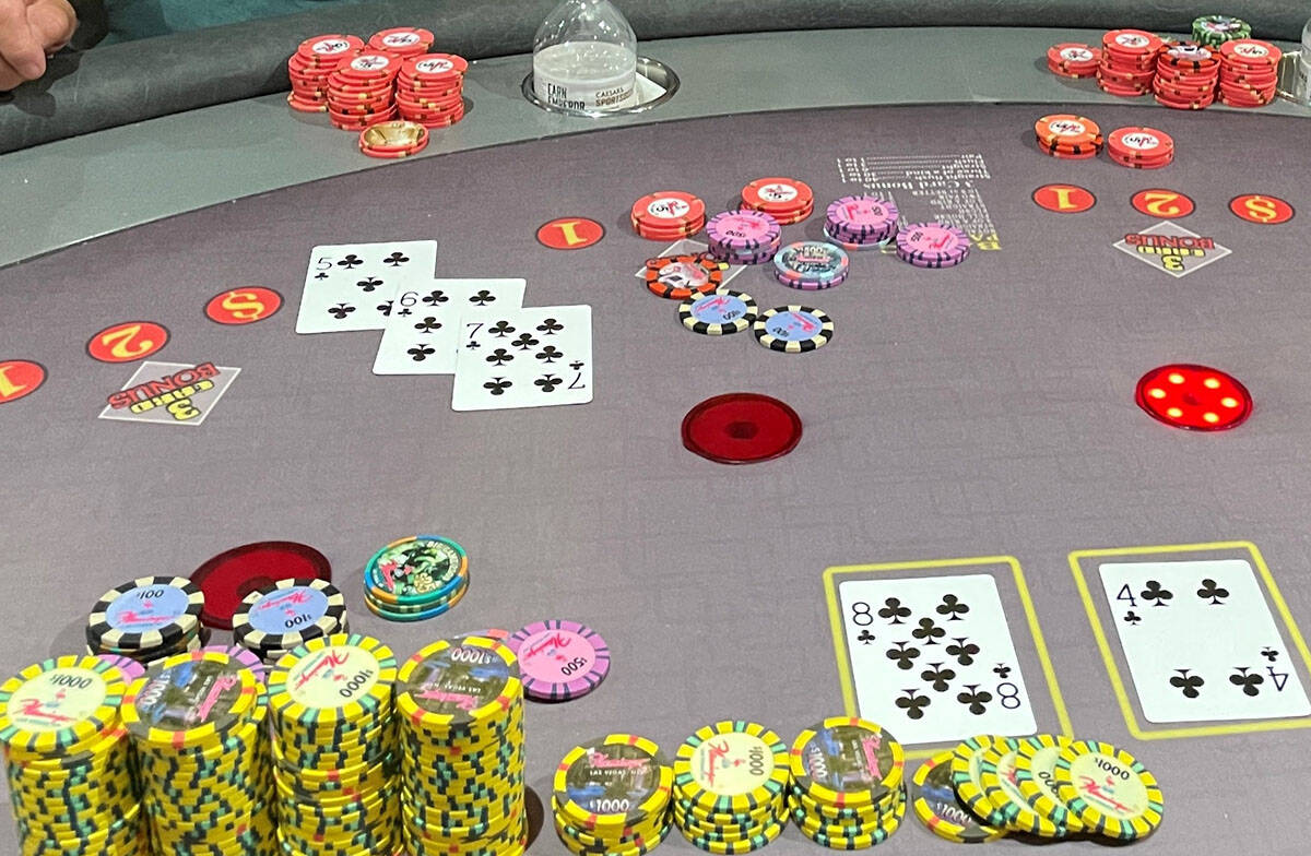 Robert Mensinger's winning straight flush was a 4 through 8 of spades. (Caesars Entertainment)