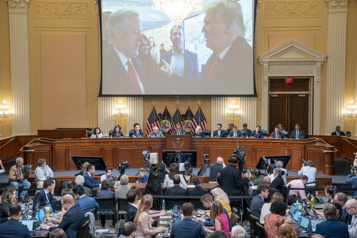 FILE - A image of former President Donald Trump talking to his chief of staff Mark Meadows is s ...