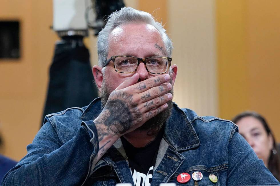 Jason Van Tatenhove, an ally of Oath Keepers leader Stewart Rhodes, listens as he testifies as ...