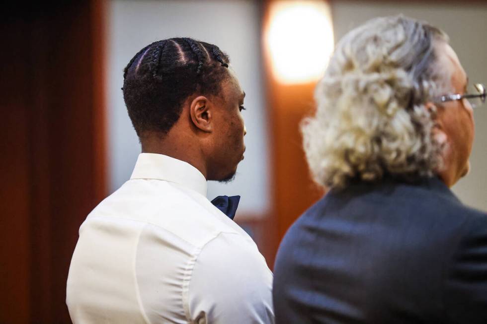 Ex-Raiders wide receiver Henry Ruggs, left, appears at a hearing next to his attorney David Che ...