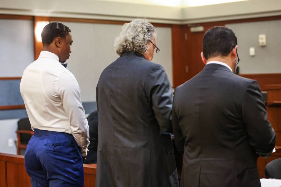 Ex-Raiders wide receiver Henry Ruggs, left, appears at a hearing next to his attorney David Che ...