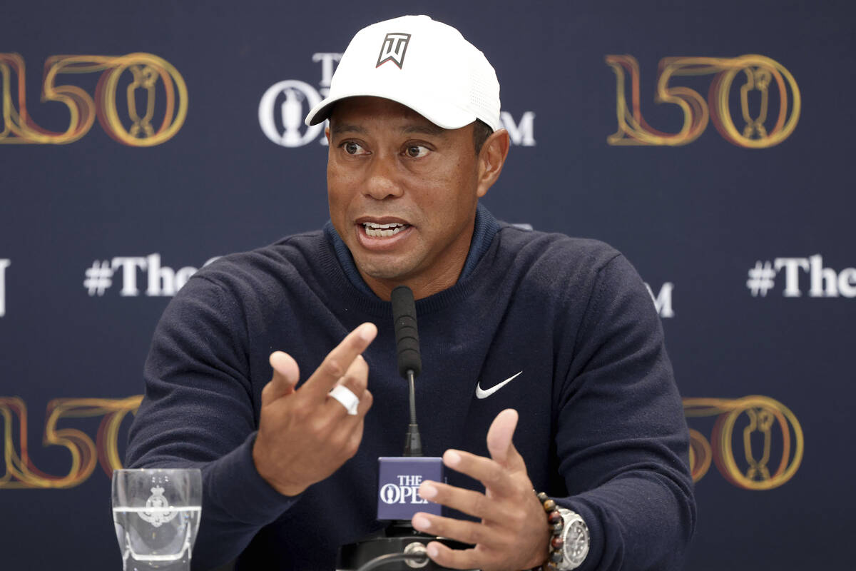 US golfer Tiger Woods speaks during a press conference at the British Open golf championship in ...