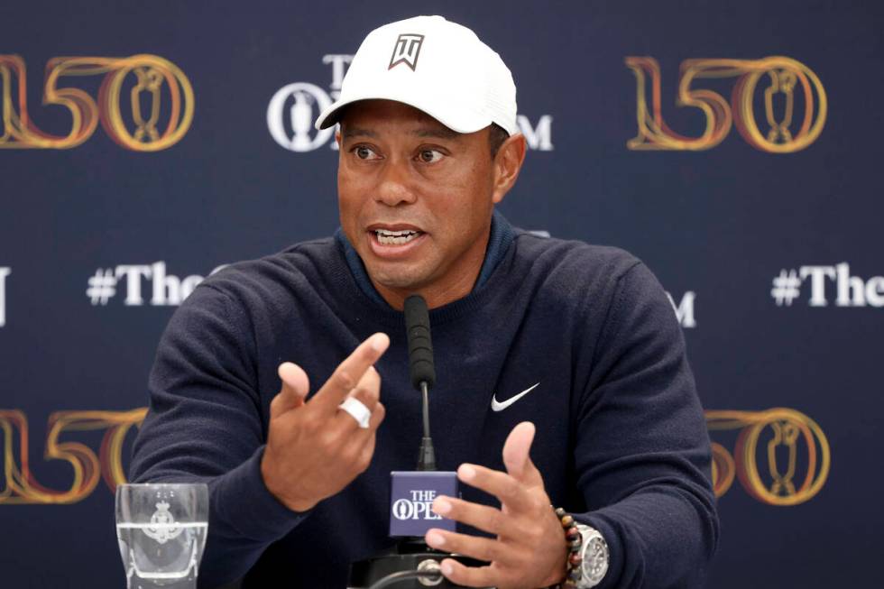 US golfer Tiger Woods speaks during a press conference at the British Open golf championship in ...