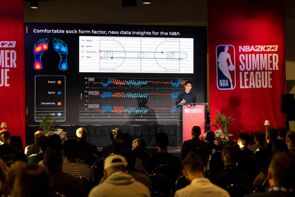 Dr. George Sun, CEO of Nextiles, speaks during an NBA basketball strategy and analytics present ...