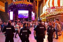 Deputies with the Las Vegas Marshals Office patrol the Fremont Street Experience on Saturday, J ...