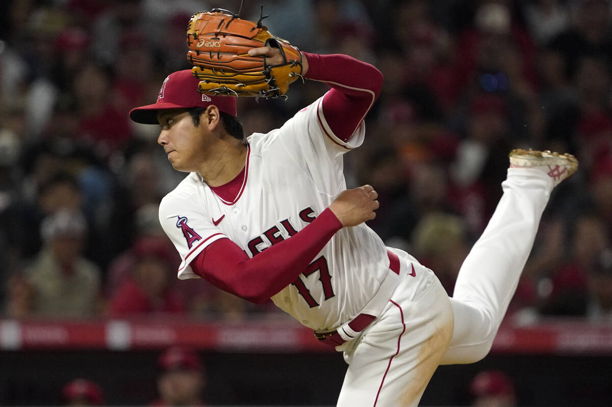 Los Angeles Angels starting pitcher Shohei Ohtani throws to the plate during the sixth inning o ...