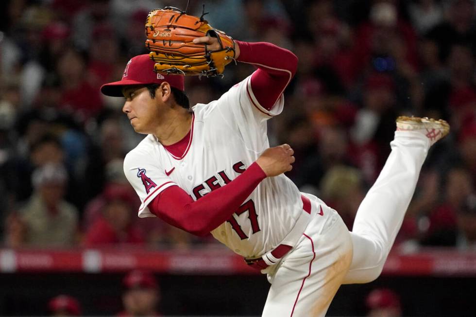 Los Angeles Angels starting pitcher Shohei Ohtani throws to the plate during the sixth inning o ...