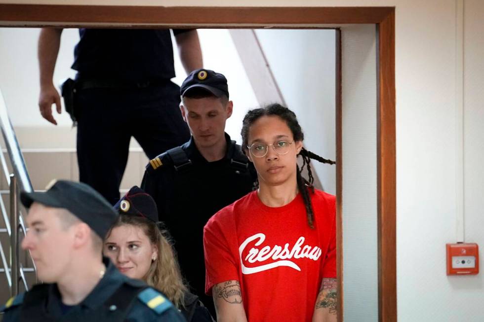 WNBA star and two-time Olympic gold medalist Brittney Griner is escorted to a courtroom for a h ...