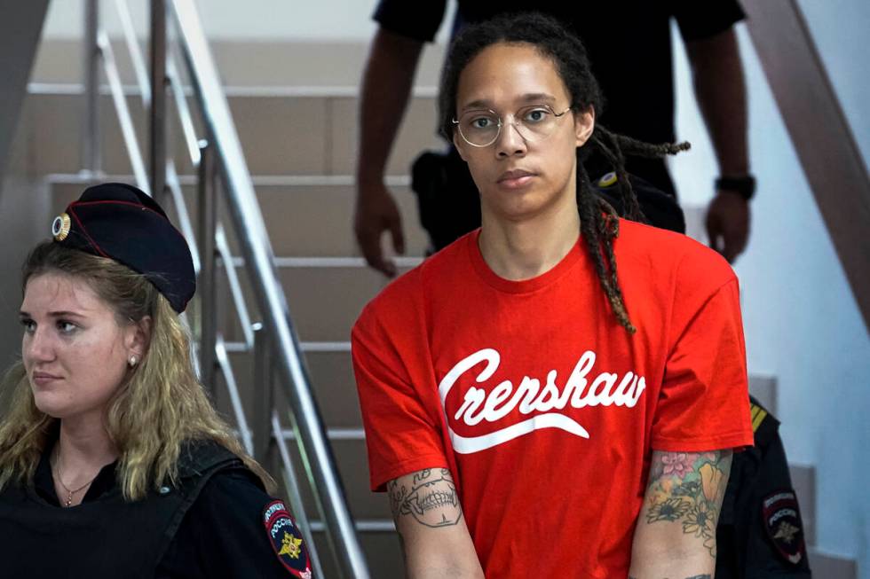 FILE - WNBA star and two-time Olympic gold medalist Brittney Griner is escorted to a courtroom ...