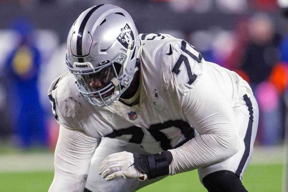 Raiders guard Alex Leatherwood (70) gets set for a play during the second half of an NFL playof ...