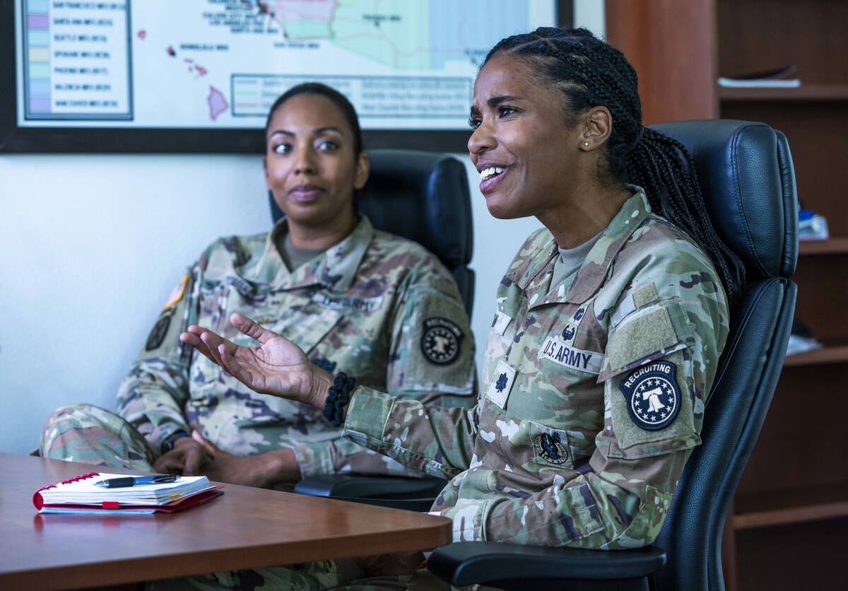 Lt. Col. Kourtney Logan, right, with Maj. Martina TaylorCampbell talks about their mission at t ...