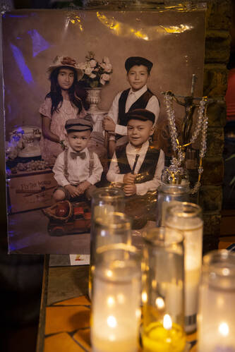 A family portrait shows, counterclockwise from upper left, Lluvia Daylenn Zacarias, Bryan Axel ...