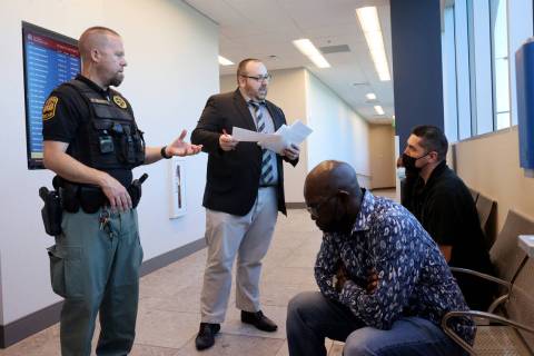 Las Vegas Deputy City Attorney Bobby Anderlik talks to people before they appear on traffic tic ...