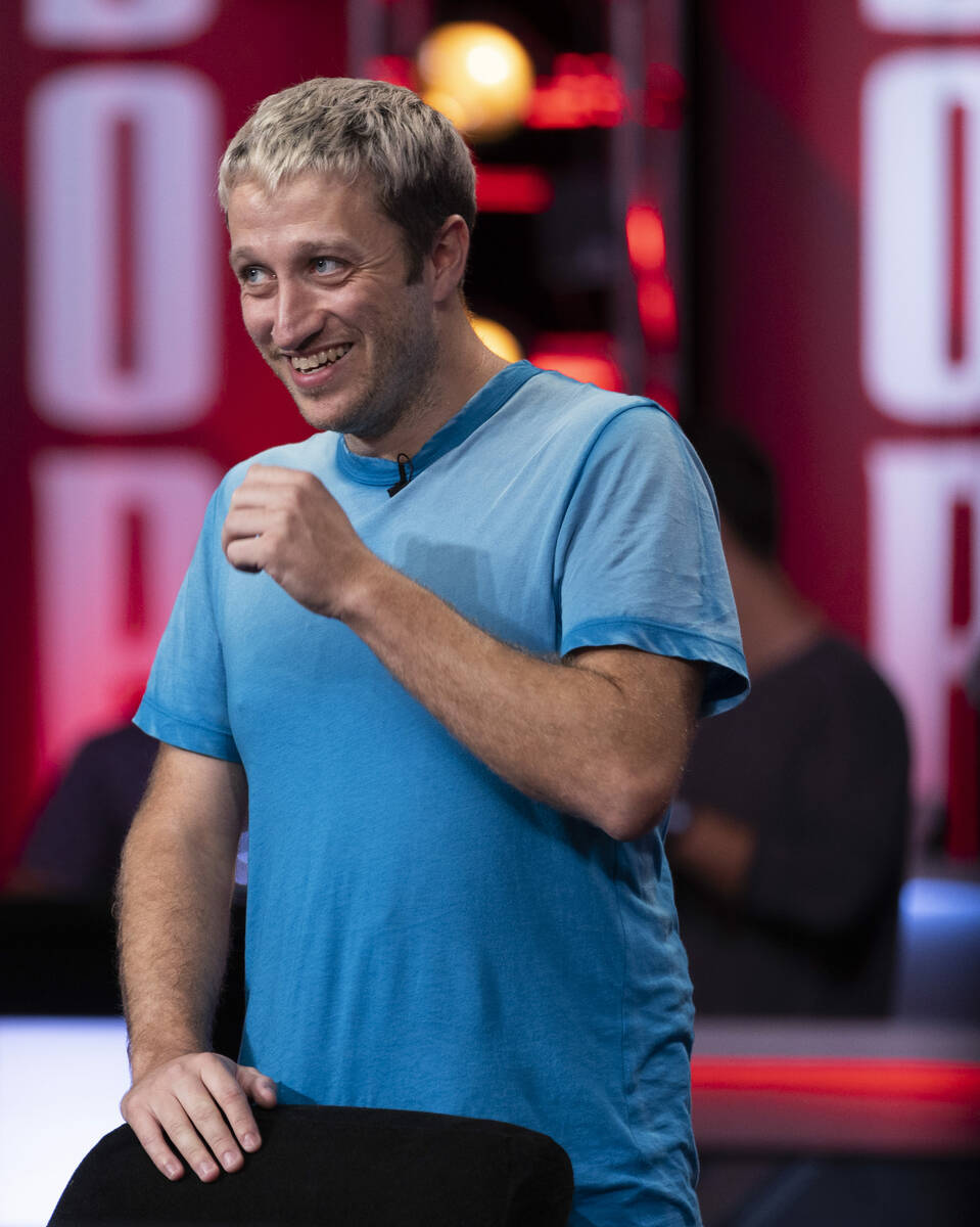 Player John Eames laughs at fans during final table play at the WSOP Main Event within the Ball ...