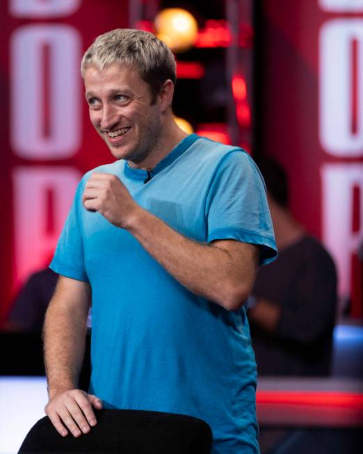 Player John Eames laughs at fans during final table play at the WSOP Main Event within the Ball ...