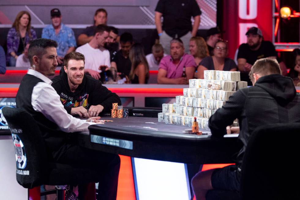 Adrian Attenborough, left, and Espen Jorstad, compete in the final table of the main event dur ...