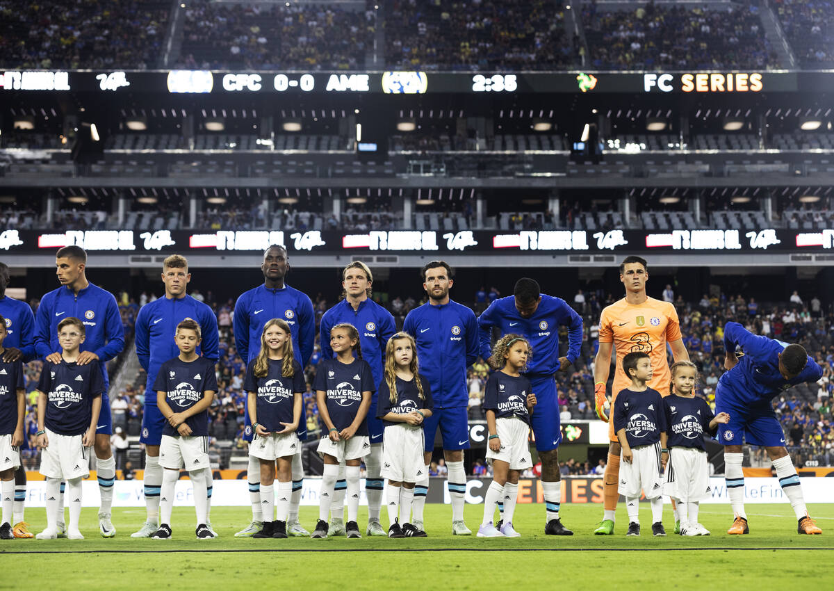 Chelsea players take the field before the start of a soccer game against Club América on S ...