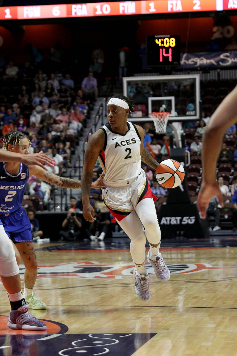 Riquna Williams #2 of the Las Vegas Aces dribbles the ball during the game against the Connecti ...