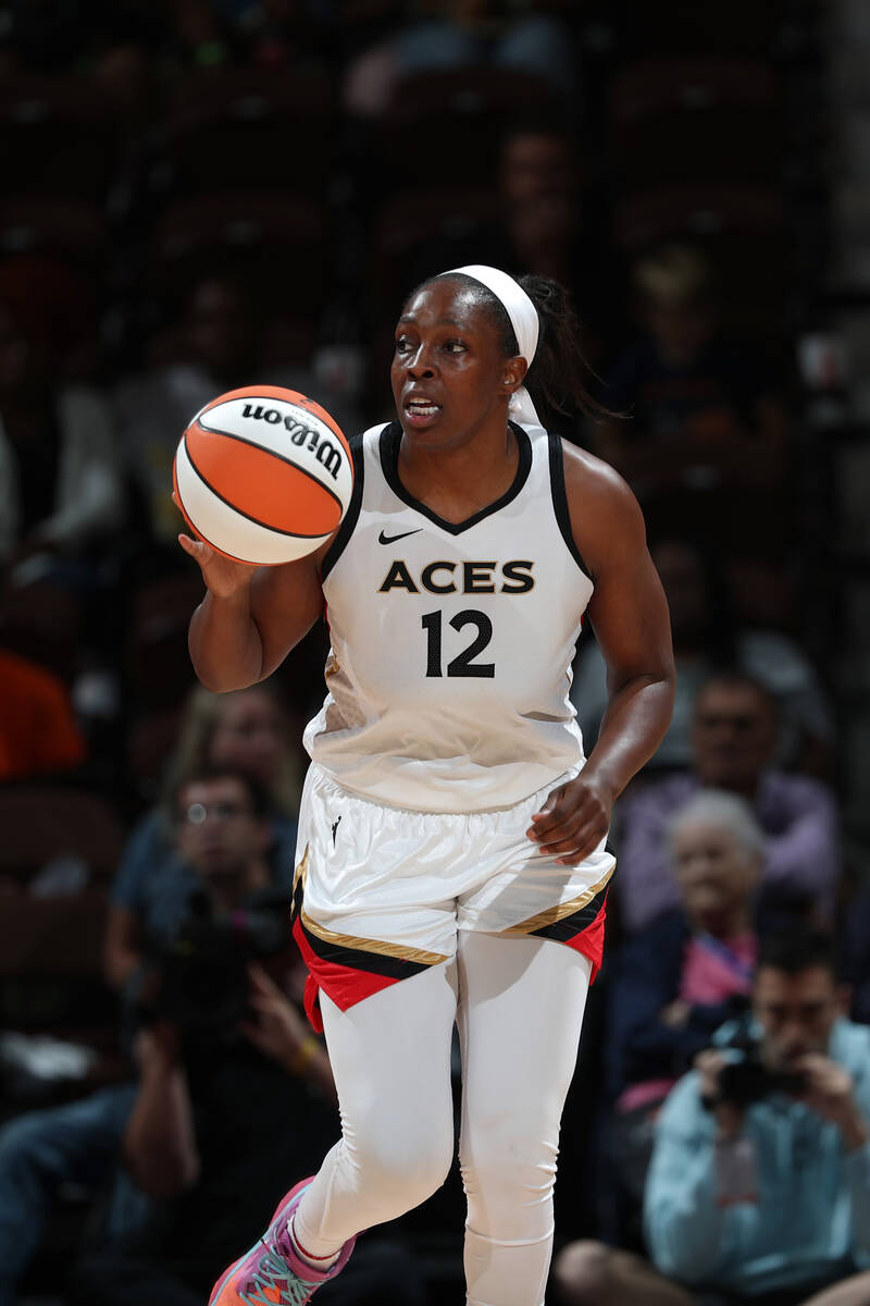 Chelsea Gray #12 of the Las Vegas Aces dribbles the ball during the game against the Connecticu ...