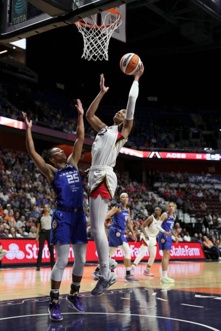 A'ja Wilson #22 of the Las Vegas Aces shoots the ball during the game against the Connecticut S ...