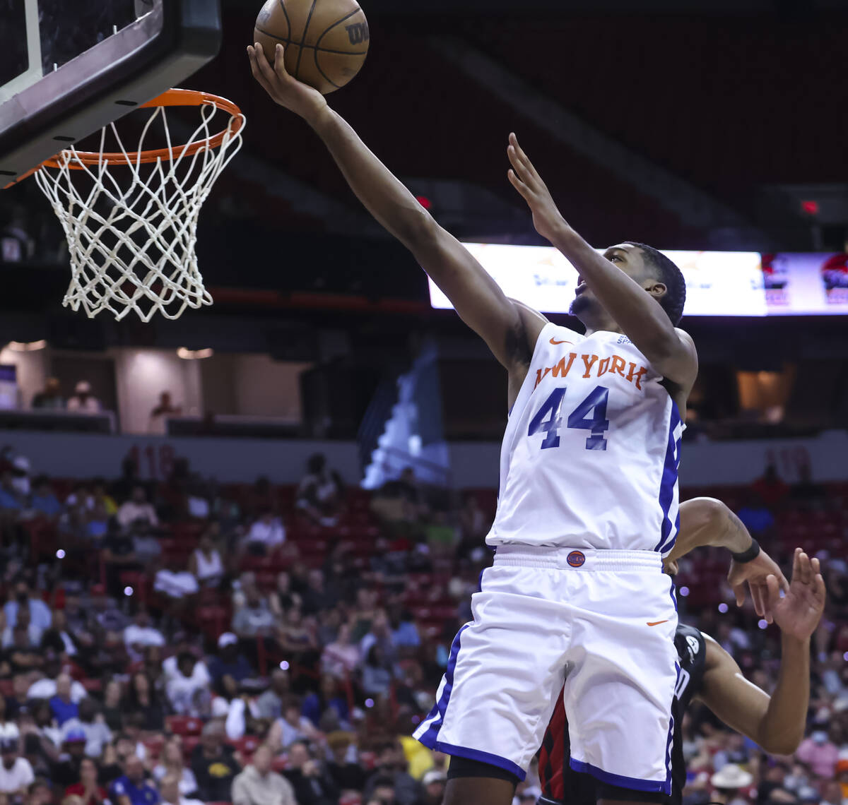 New York Knicks' Feron Hunt (44) lays up the ball against the Portland Trail Blazers during the ...