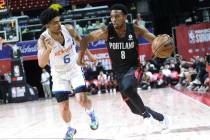 Portland Trail Blazers' Brandon Williams drives the ball against New York Knicks' Quentin Grime ...