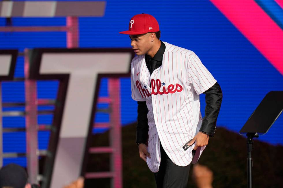 Justin Crawford walks on the stage after being selected by the Philadelphia Phillies with the 1 ...