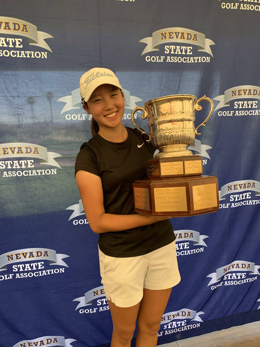 Eunice Han holds the winner's trophy after capturing the Nevada Women's State Amateur at Boulde ...