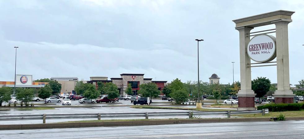 Emergency responders work at the scene of a deadly shooting Sunday, July 17, 2022, at the Green ...