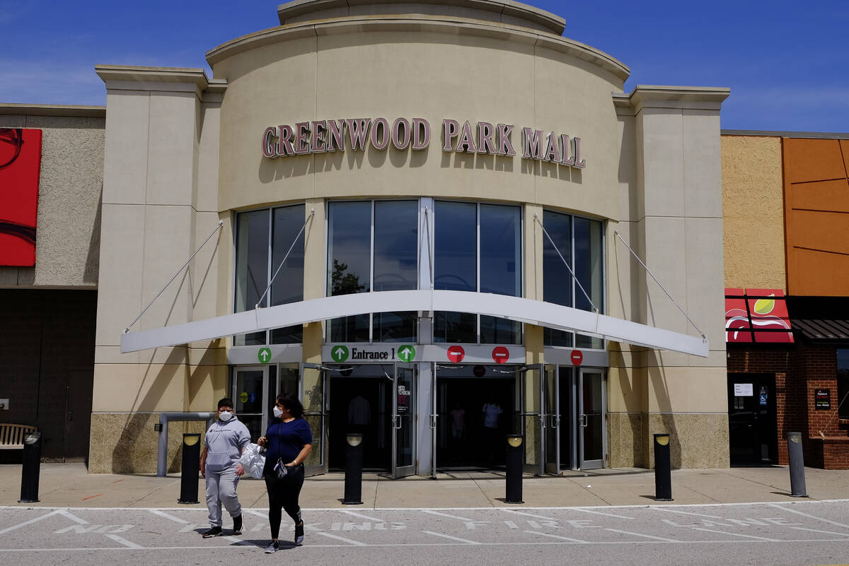 FILE - Shoppers leave the Greenwood Park Mall on May 4, 2020, in Greenwood, Ind. Indianapolis M ...