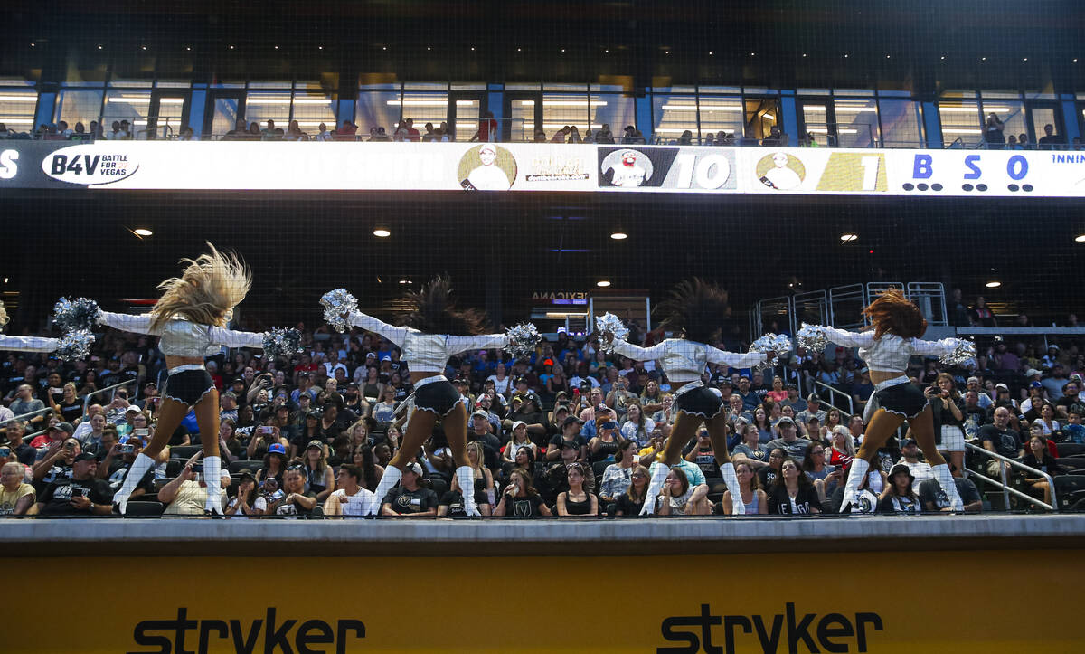 The Raiderettes perform during the Battle for Vegas charity softball game on Monday, July 18, 2 ...