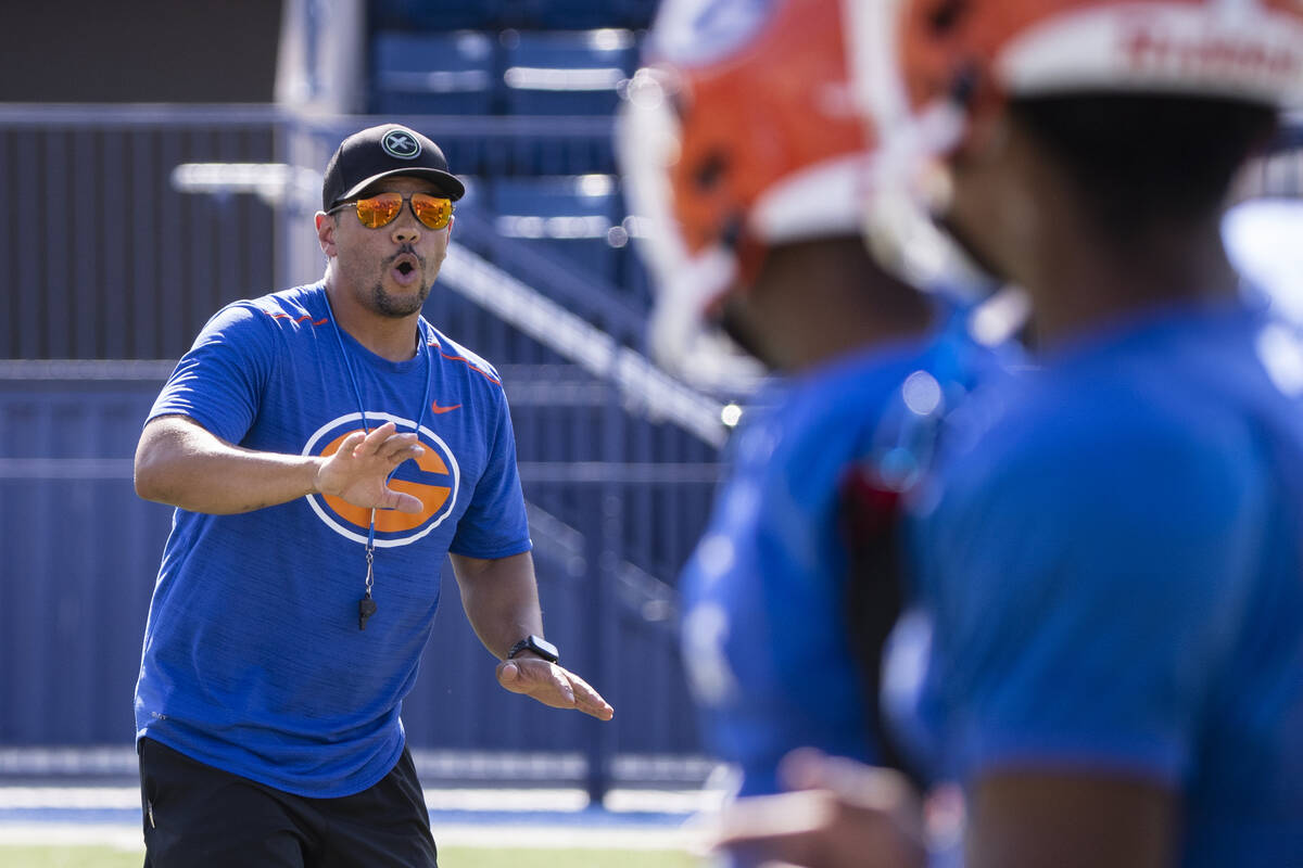 Bishop Gorman High School head coach Brent Browner directs his players during team's practice T ...
