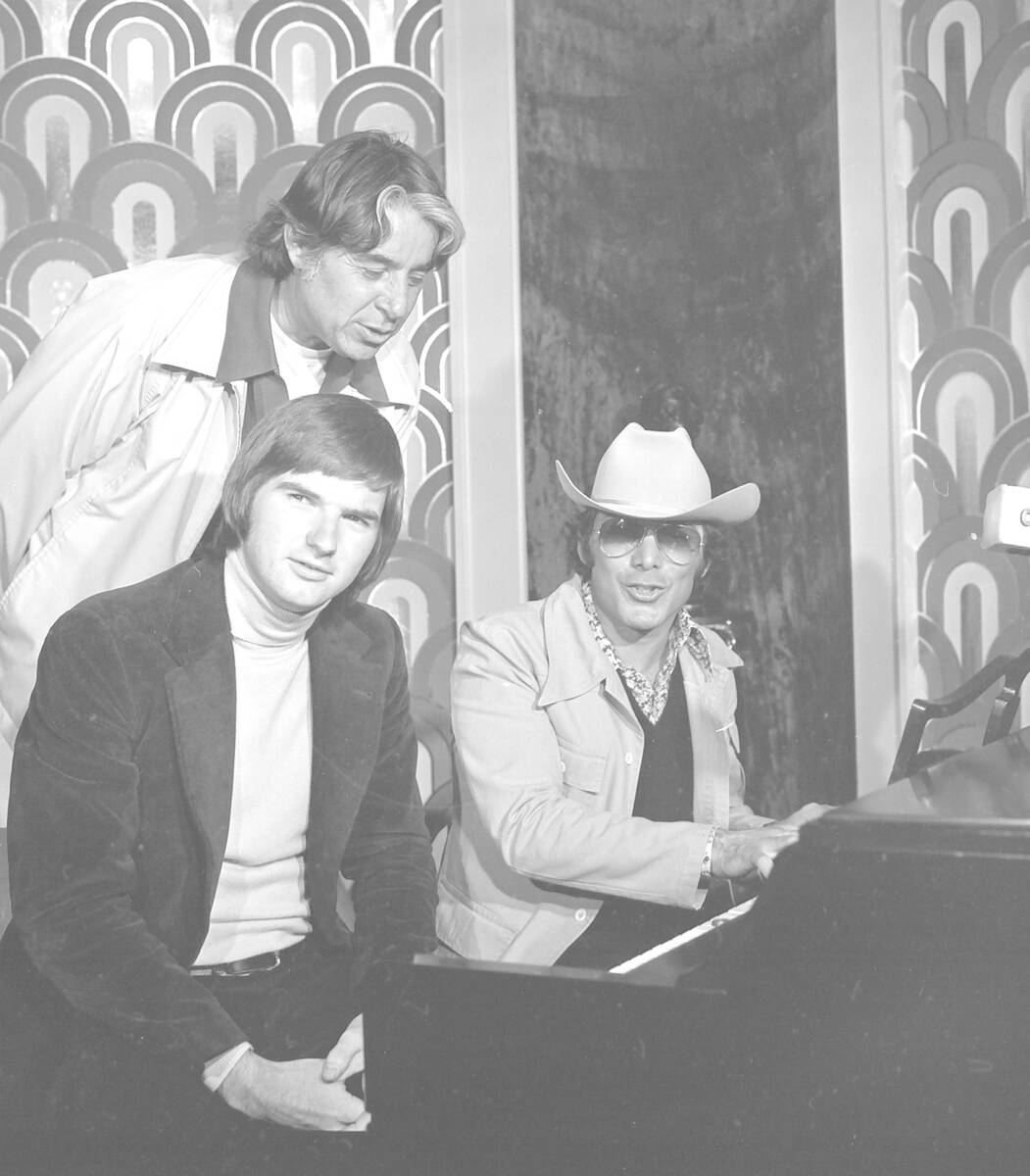 Paul Anka with Jimmy Connors, left, and Pancho Gonzalez, center, at Caesars Palace on April 2, ...