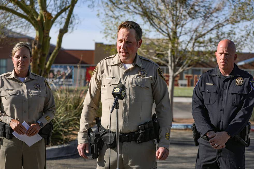 Capt. Reggie Rader, who heads the LVMPD Organizational Development Bureau, addresses the media ...