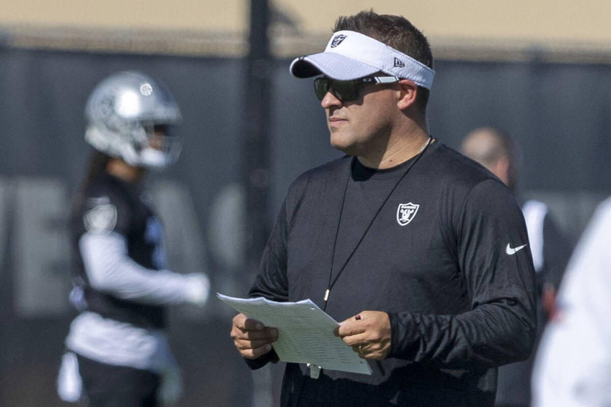 Raiders head coach Josh McDaniels observes the team’s training camp practice at the Inte ...