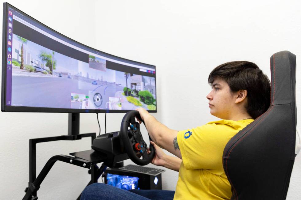 Remote car pilot Antonella Siracusa-Rosa demonstrates driving a Halo.Car at the startup’ ...