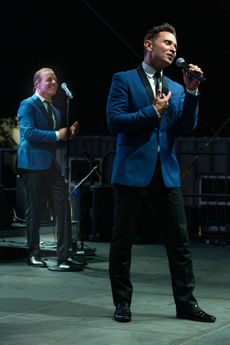 Christian Hoff, left and Travis Cloer are shown onstage at "The Rockin' Retro Drive-In Show" at ...