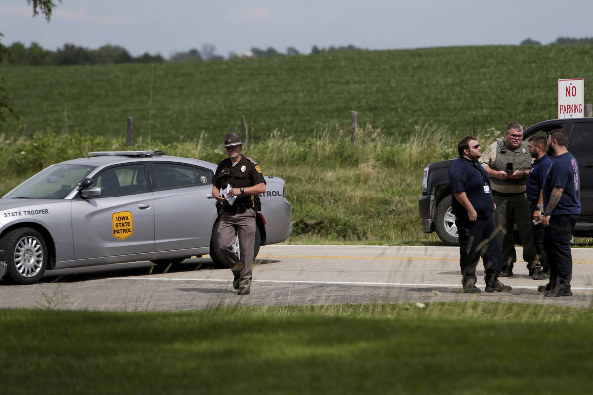 Emergency personnel block an entrance to the Maquoketa Caves State Park as investigate a shooti ...