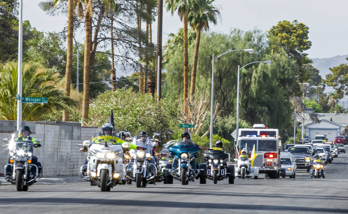 The Patriot Guard Riders of Nevada escort the Raymond J. Pfeifer Memorial Caisson along South B ...