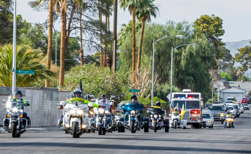 The Patriot Guard Riders of Nevada escort the Raymond J. Pfeifer Memorial Caisson along South B ...
