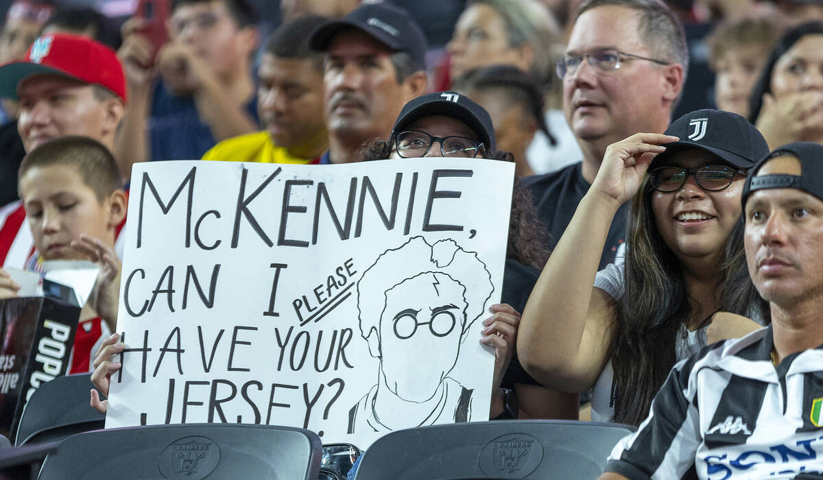 A Juventus fan is hoping for the jersey of midfielder Weston McKennie (14) during the first hal ...
