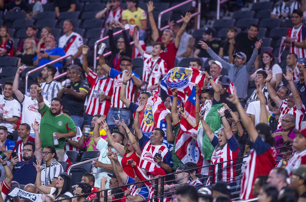 Chivas Guadalajara fans cheer on their team versus Juventus during the first half of their Socc ...