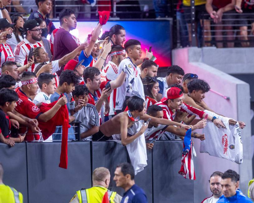 Chivas Guadalajara fans call for autographs as players take the field for the first half of the ...