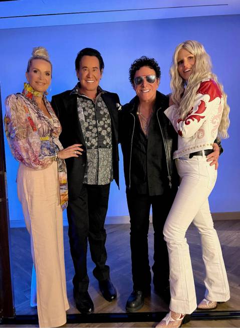 Kathleen Newton, Wayne Newton, Neal Schon and Michaele Schon are shown after Journey's performa ...