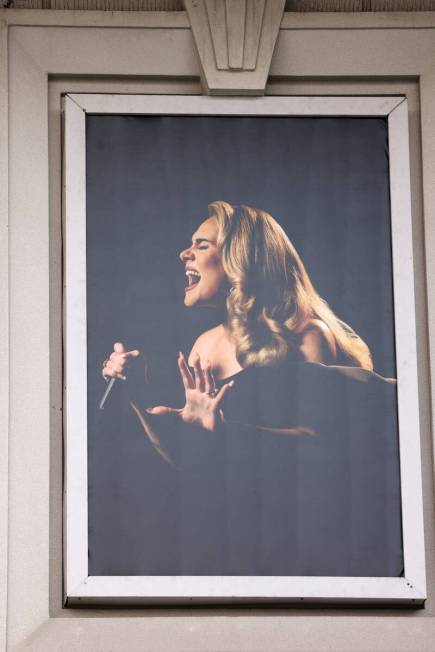 Adele in a photo at an entrance to Caesars Palace on the Strip in Las Vegas Monday, July 25, 20 ...