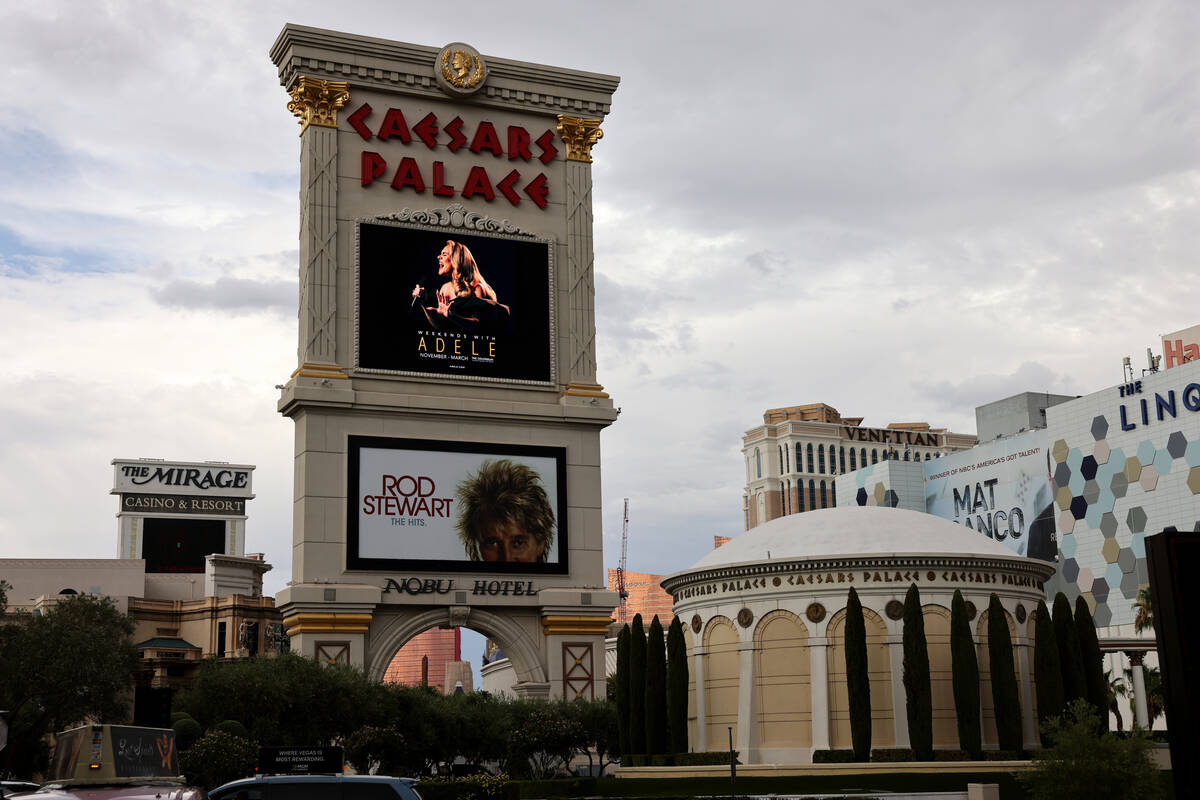 An ad announcing “Weekends With Adele” residency on the marquee at Caesars Palace ...